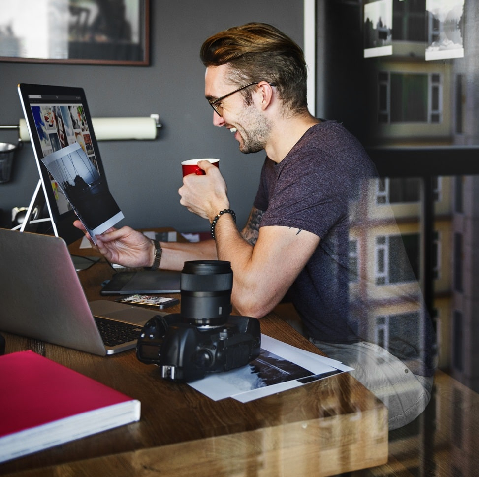 Stack Blue developers collaborating with a client's in-house tech team